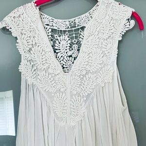 White a-line, airy, summer sleeveless blouse